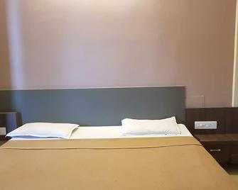 Hotel Bhagwati Lodging - Kolhapur - Habitación