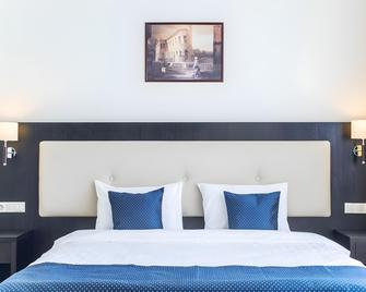 Nogai Hotel Kazan - Kasan - Schlafzimmer
