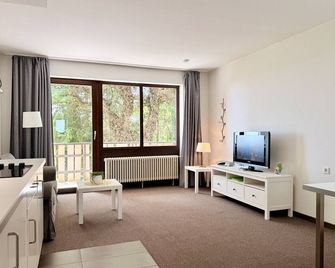 Kastanienhof Apartment Hotel - Dannenfels - Living room