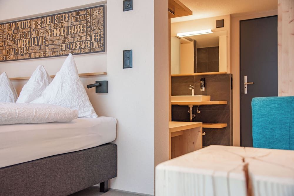 Eiger Lodge Chic - גרינדלוואלד - חדר שינה