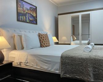 B & A Suites Inn - Anápolis - Slaapkamer