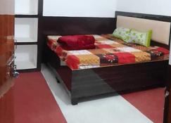 OYO Home Kd Group Homestay - Faizābād - Bedroom