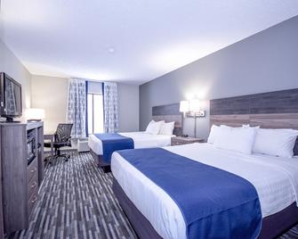 Days Inn & Suites by Wyndham Wisconsin Dells - Wisconsin Dells - Bedroom
