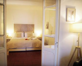 Quickhome Piazza Cisterna - Biella - Schlafzimmer