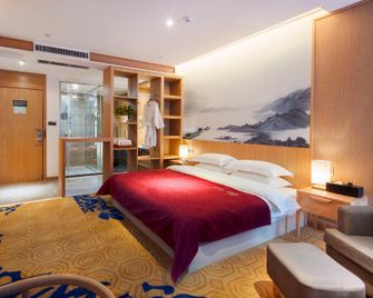 Qianna Hotel(Zhengzhou Erqi Wanda Jingguang Road) - Zhengzhou - Bedroom