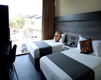 Homesuites Malecon - Culiacán - Schlafzimmer