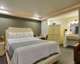 Romantic Inn & Suites - Dallas - Chambre