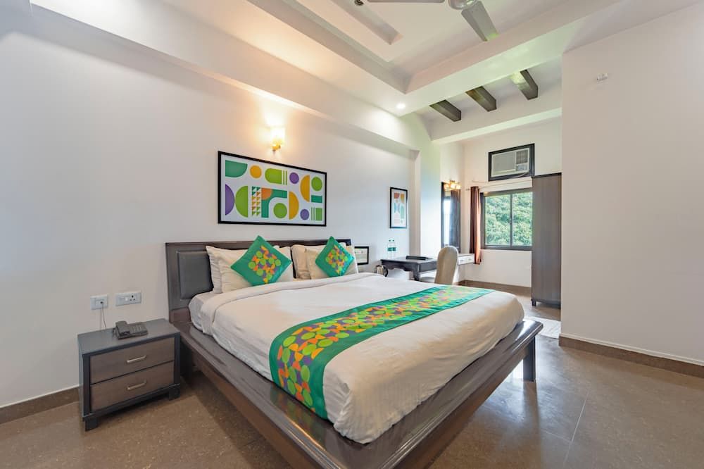 Treebo Shivam Inn Near Singapore Mall - לאקנאו - חדר שינה