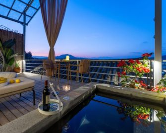 Xinyue Suying Hot Spring Holiday Hotel - Baoshan - Balcony