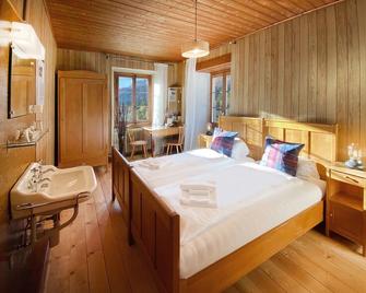 Du Glacier Boutique & Traditions Hotel - Fiesch - Спальня
