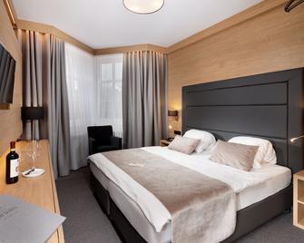 هوتل سنيزكا - سبندلروف ملين - غرفة نوم