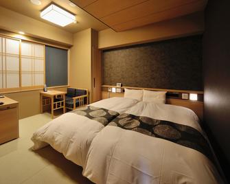 Tennen Onsen Toyama Tsurugi no Yu Onyado Nono - Toyama - Bedroom