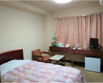 Business Hotel Tenmonkan - Kagoshima - Schlafzimmer