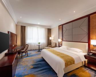 West Lake International Hotel - Hotan - Bedroom