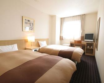 Hirosaki Plaza Hotel - Hirosaki - Slaapkamer