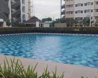 SMDC Park Residences an accessible condo in enchanting Calabarzon with AC, WiFi. - Santa Rosa - Piscine