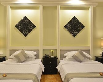 Bayon Boutique - סיאם ריפ - חדר שינה