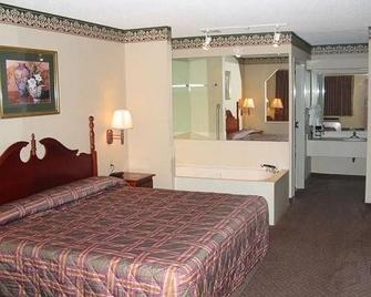 Nola Inn And Suites - New Orleans - Schlafzimmer
