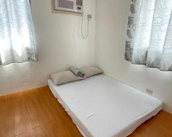 Charming 2-bedroom house with AC, WiFi in Pagadian City - Pagadian - Bedroom