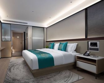 Tongxiang Esteem Wisdom Hotel - Jiaxing - Schlafzimmer