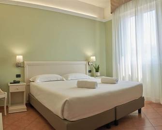Hotel Aquila - Castelfranco Emilia - Спальня