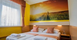 Hotel Tabor Maribor - Maribor - Slaapkamer