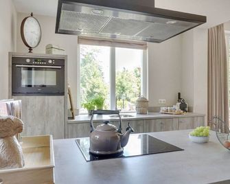 Holiday Home with a terrace at Bedafse Bergen - Uden - Building