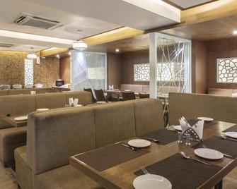 Hotel Host Inn - Ahmedabad - Restaurante