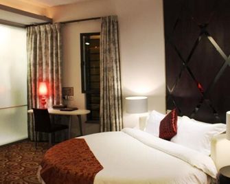 Guangjia Business Hotel - Qingyuan - Habitación