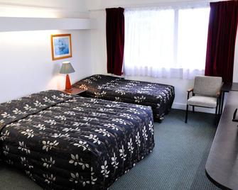 برايمار موتور إن - نيو بليموث - غرفة نوم