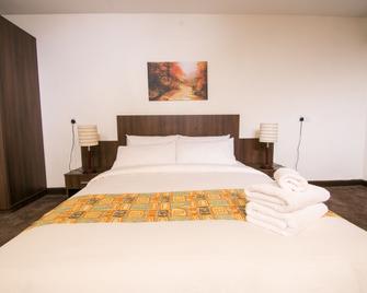 Sinclair Guest House - Abuja - Schlafzimmer