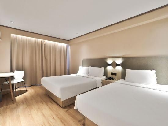 Hanting Hotel (Changchun Railway Station) - צ'נגצ'ון - חדר שינה