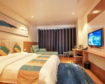 Vx Zibo Zhangdian District Jinjing Avenue Hotel - C-po - Ložnice
