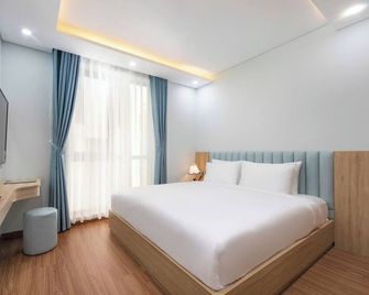 Hummer Hotel & Apartment Danang Beach - Da Nang - Habitación