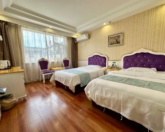 Xinglong Hotel (Jining Yanzhou Railway Station Branch) - Jining - Bedroom
