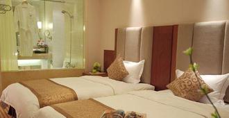 Holiday Plaza Hotel Jiayuguan - Jiayuguan - Bedroom
