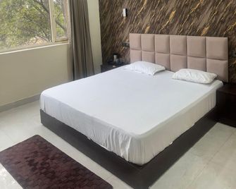 Hotel nine hearts - Pānīpat - Bedroom