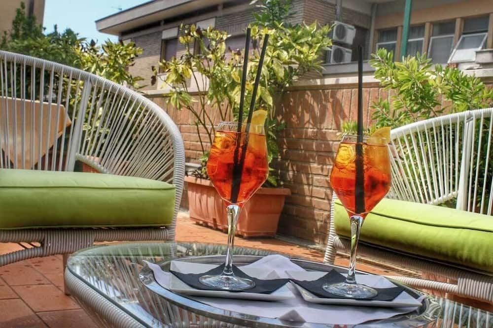 Dal Moro Gallery Hotel - אסיסי - פטיו