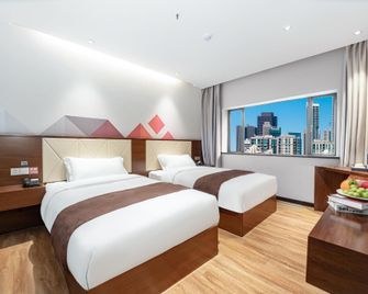 Borrman Hotel Jingzhou Ancient City East Gate Wanda - Jingzhou - Schlafzimmer