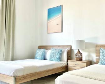 Aqualara Villa Luxury Island Retreat w/ Rooftop Lounge Pool - Parrot Cay Island - Schlafzimmer
