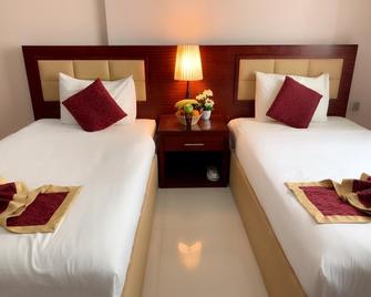 Hala Inn Hotel Apartments - Ajman - Bedroom