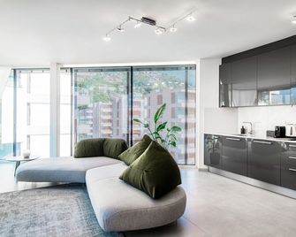 Flat Iron Apartments by Quokka 360 - modern building 5 min from the centre of Lugano - Lugano - Living room