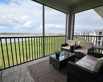 Charming 2-bedroom condo on 4th Floor at The National at Ave Maria - Immokalee - Balcony