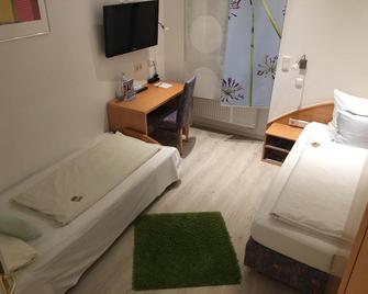Hotel Barbarossa Karlsruhe Stadtmitte - Karlsruhe - Bedroom