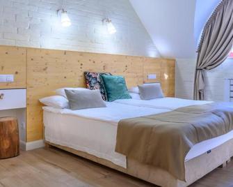 Hotel Tókert Szálloda és Étterem - Lillafüred - Bedroom