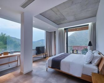 Yunyou Boinn Guesthouse Moganshan - Huzhou - Bedroom