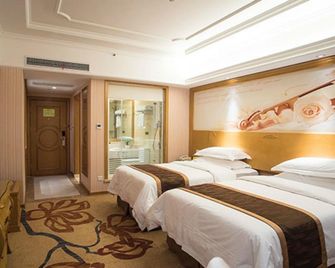 Vienna International Hotel Meizhou Dingzi Bridge - Meizhou - Bedroom