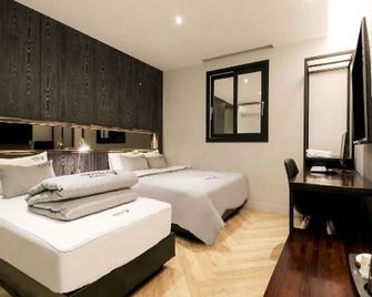 V Hotel - Pusan - Sovrum
