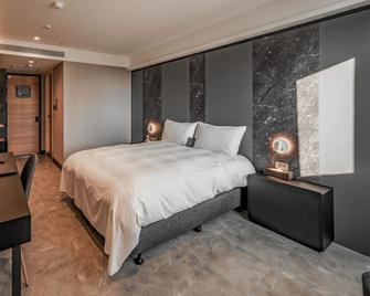 باريس هوتل - مدينة كاوهسيونغ - غرفة نوم