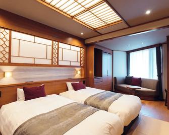 Hanabishi Hotel - Hakodate - Slaapkamer